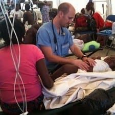 Pediatrician volunteer and patient